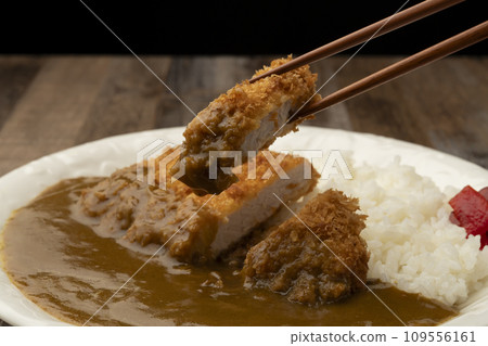 Cutlet curry with chopsticks 109556161