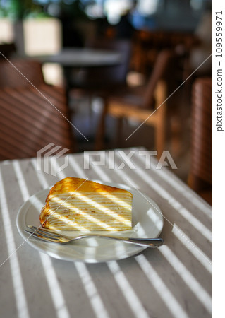 Mille crepes on a cafe table 109559971