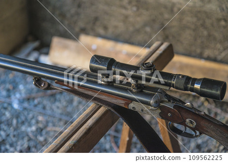 Close up for one rifle with optical sight Close up for one rifle with optical sight 109562225