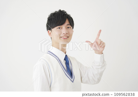 High school boy signing check white background High school boy signing check white background 109562838