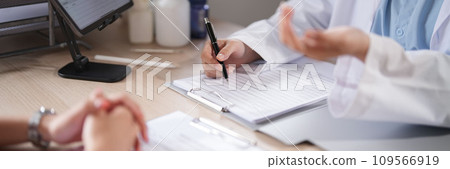 Asian psychologist women giving counseling to explaining about medicine with mental health therapy to patient in clinic while female patient stressful and anxiety with psychological health problem 109566919