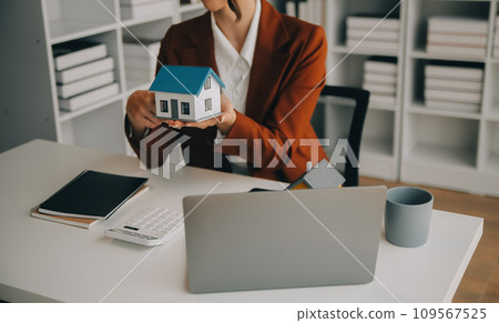 Young friendly operator woman agent with headsets working in a call centre. 109567525