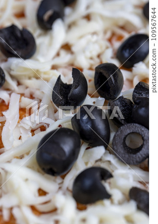 pizza dough with cheese and meat and olives pizza dough with cheese and meat and olives 109567644