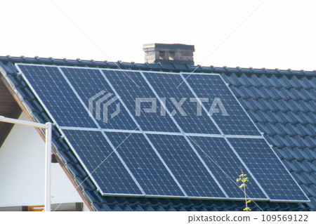 Solar power energy on the roof to a standard house 109569122