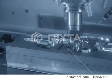 The CNC milling machine cutting  forging mold part by solid ball end mill tool. 109569662