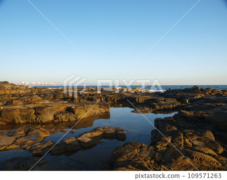 The rocky beach of Mooloolaba, Queensland, Sunshine Coast, Australia in the morning. The rocky beach of Mooloolaba, Queensland, Sunshine Coast, Australia in the morning. 109571263