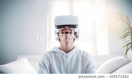 Portrait of happy smiling enthusiastic Caucasian guy man person in virtual reality headset in white room. Portrait of happy smiling enthusiastic Caucasian guy man person in virtual reality headset in white room. 109571892