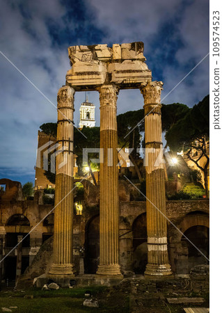 Scenic night view of Roman Forum site illuminated columns 109574523