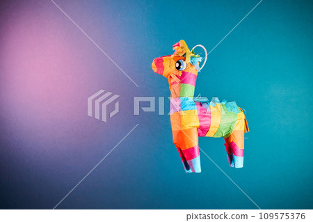 Traditional mexican dunky pinata craft made of paper for posadas and birthdays 109575376