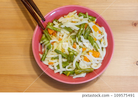 Udon noodles with vegetables on wooden table. Japanese cuisine. Asian food 109575491