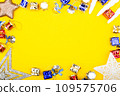 Christmas background. New Year banner Template with gift boxes, stars, bells, toys, decorations. Bright Christmas frame. Copy space. Winter holidays New Year. Top view photo for message or advertising 109575706