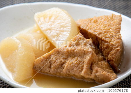 Fried tofu and simmered radish. Fried tofu and simmered radish. 109576178