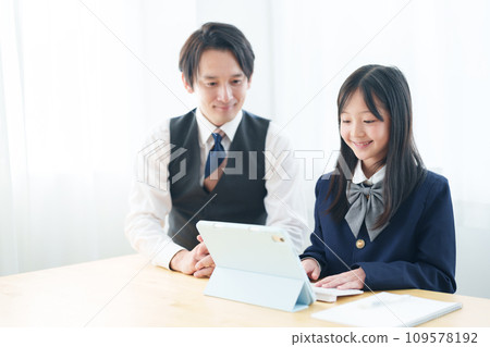 Studying tablet girl teacher 109578192
