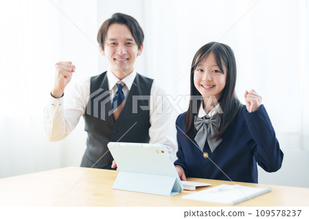Guts pose teacher elementary school girl tablet 109578237