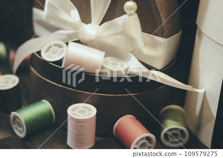 Sewing thread and chic ribbon gift film style photo Sewing thread and chic ribbon gift film style photo 109579275