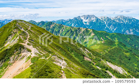 Climbing Mt. Jigatake in summer (view from the middle peak of Mt. Jjigatake towards the south peak and Mt. Tateyama) 109579593