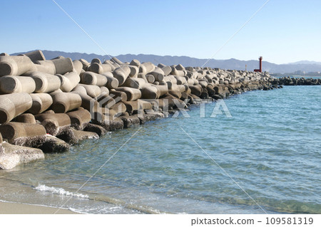 Blue sea coastline and harbor with tetrapods 109581319