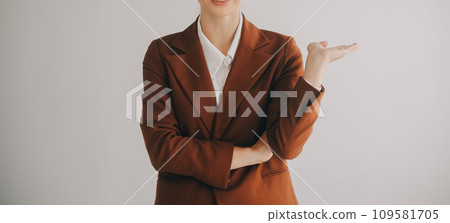 Beautiful female call center operator working on computer in office Beautiful female call center operator working on computer in office 109581705