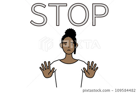 An African woman who puts her hand out in front of her body to signal a stop. An African woman who puts her hand out in front of her body to signal a stop. 109584482