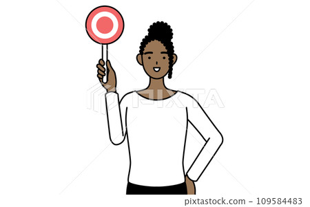 African woman holding a circle stick showing the correct answer African woman holding a circle stick showing the correct answer 109584483