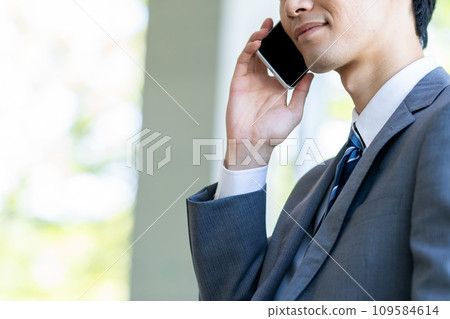 Businessman making a call (parts) Businessman making a call (parts) 109584614