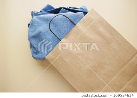 top view of craft paper bag with shirt , top view of craft paper bag with shirt , 109584634