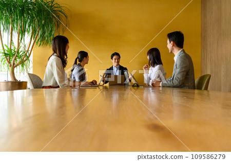 Conference room with business people in a meeting Conference room with business people in a meeting 109586279