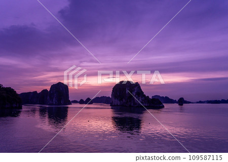 Sunset view from the deck of a cruise ship on a cruise in Halong Bay, Vietnam Sunset view from the deck of a cruise ship on a cruise in Halong Bay, Vietnam 109587115