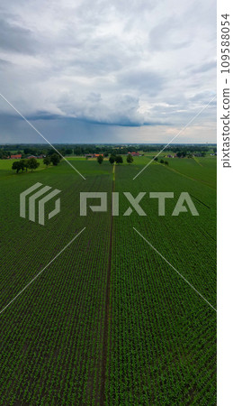 Impending Storm: Aerial View of Fields Under Gathering Clouds Impending Storm: Aerial View of Fields Under Gathering Clouds 109588054
