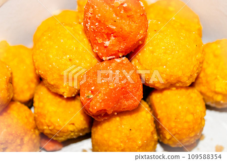 A picture of laddoo with selective focus 109588354