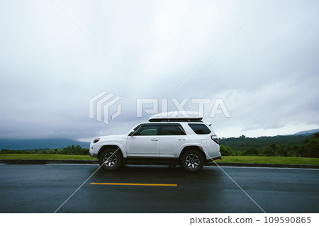 Off road car on top of mountain trail, China Off road car on top of mountain trail, China 109590865