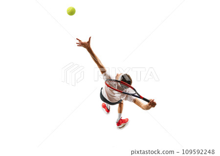 Top view. Dynamic image of sportsman, tennis player in motion, serving ball with racket, playing isolated over white background. Sport Top view. Dynamic image of sportsman, tennis player in motion, serving ball with racket, playing isolated over white background. Sport 109592248