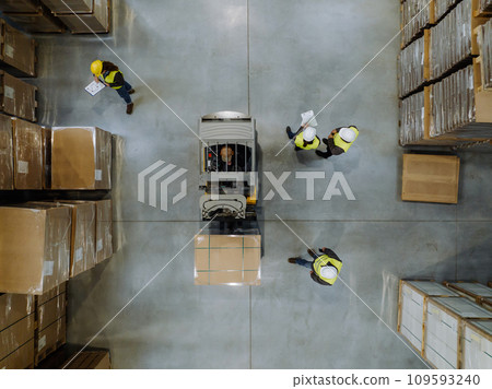 Top view of forklift in a modern warehouse storage of retail shop, large factory workshop space. Modern industrial factory with warehouse. 109593240