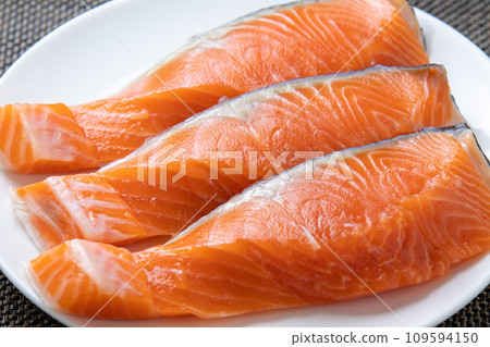 Three pieces of coho salmon fillet. Three pieces of coho salmon fillet. 109594150