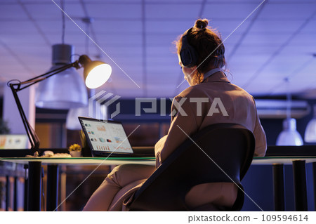 Executive manager checking financial growth report before start planning company investment strategy to increase profit. Busiensswoman analyzing marketing graphs, working overhours in startup office Executive manager checking financial growth report before start planning company investment strategy to increase profit. Busiensswoman analyzing marketing graphs, working overhours in startup office 109594614