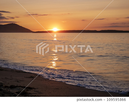Beautiful sunset at Portnoo Narin beach in County Donegal - Ireland Beautiful sunset at Portnoo Narin beach in County Donegal - Ireland 109595866