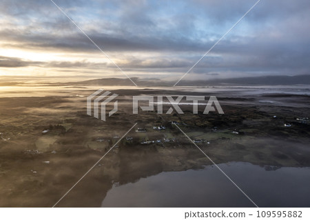 Aerial view of Lough fad in the morning fog, County Donegal, Republic of Ireland 109595882