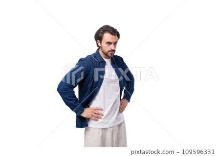 portrait of a young European brutal brunette man with a cool hairstyle dressed stylishly and portrait of a young European brutal brunette man with a cool hairstyle dressed stylishly and 109596331