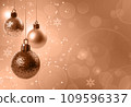 Christmas card with hanging balls toned with peach fuzz color of the year 109596337