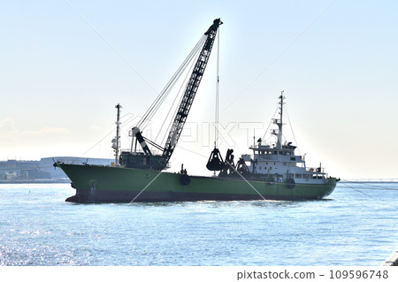 Offshore seawall construction - foundation rubble stone installation work Offshore seawall construction - foundation rubble stone installation work 109596748