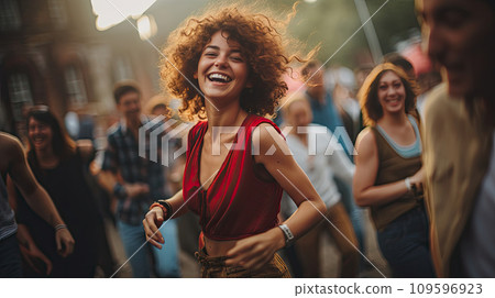 young woman enjoying at music festival 109596923