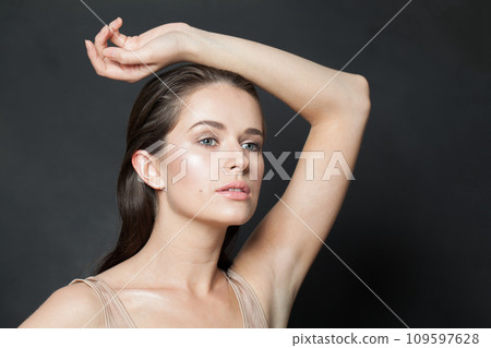 Nice healthy brunette woman with clear skin. Skincare, wellness 109597628