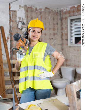 Portrait of smiling young woman engineer Portrait of smiling young woman engineer 109598847