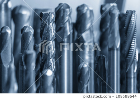 Close-up scene group of the used flat or square solid end mill tools. 109599644