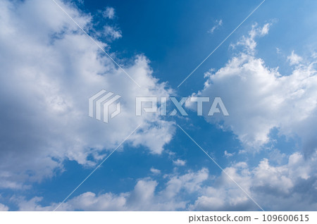 White clouds flowing in the blue sky White clouds flowing in the blue sky 109600615