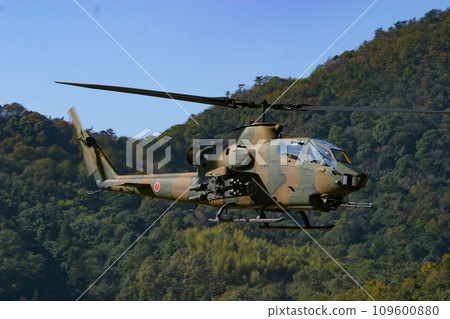 Ground Self-Defense Force anti-tank helicopter AH-1S in flight Ground Self-Defense Force anti-tank helicopter AH-1S in flight 109600880