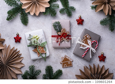 Festive gift box with eco design. Christmas concept Festive gift box with eco design. Christmas concept 109601264