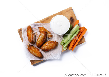 Buffalo spicy chicken wings with cayenne pepper sauce isolated on white background 109602454