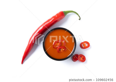 Spicy chili sauce in a bowl isolated on white background Spicy chili sauce in a bowl isolated on white background 109602456