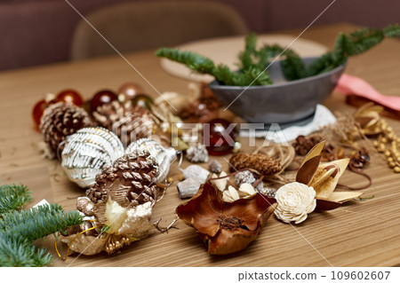 Homemade Craft christmas tools and decorations on table 109602607